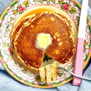 Easy homemade pancakes on a flowered plate.