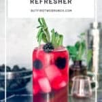 Pinterest image of a blackberry sage refresher on a black counter with a accoutrements behind.