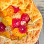 Citrus Galette with lemon curd on a wire rack.