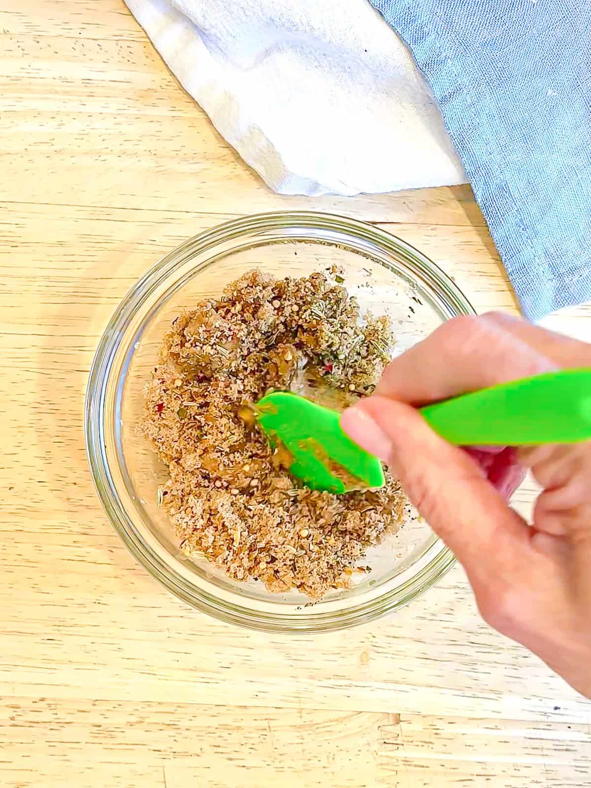 Mixing sugar and spices to add to the top of crispy corned beef.