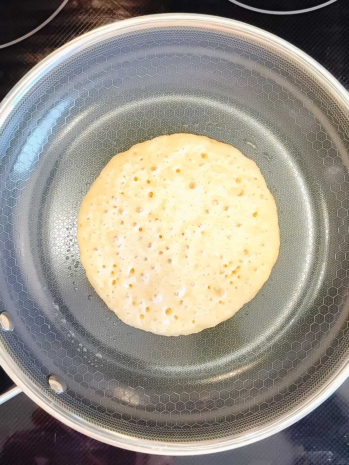 Pancake in a nonstick pan.