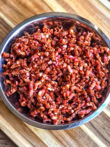 Raw homemade Mexican chorizo in a metal bowl.
