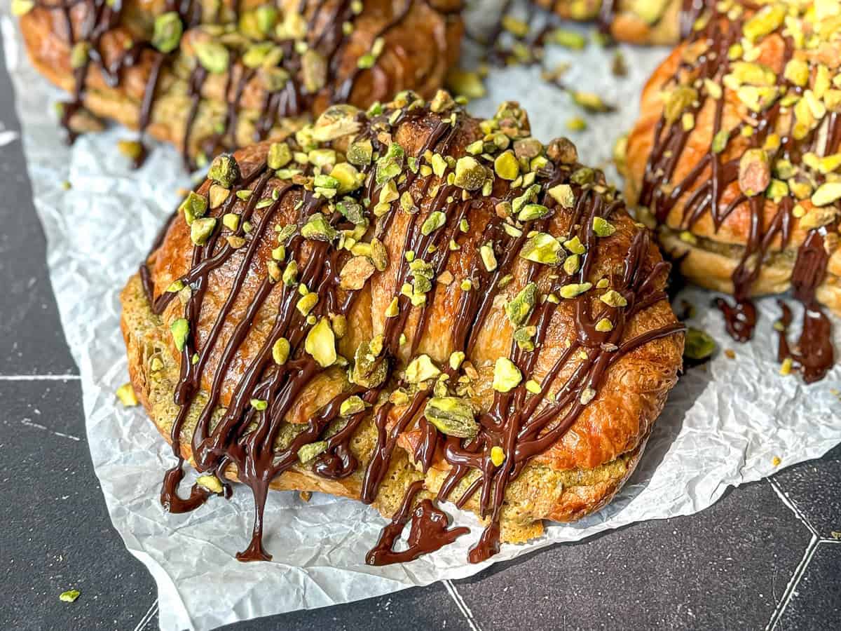 Twice baked pistachio croissant with chocolate.