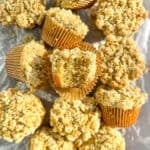 Pistachio muffins on parchment paper.
