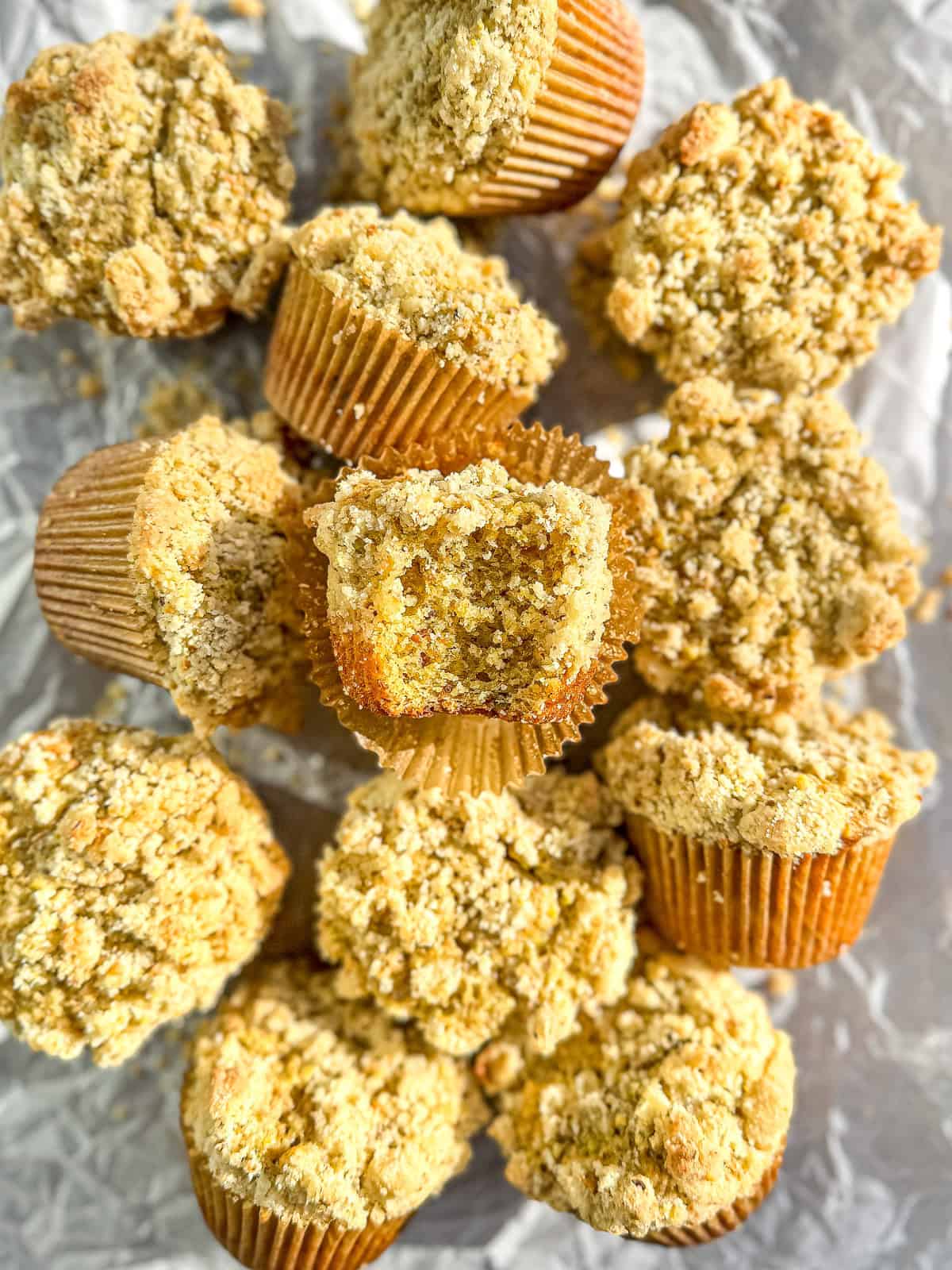 Pistachio muffins on parchment paper.
