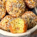 Basket of jalapeño corn muffins, one split open.