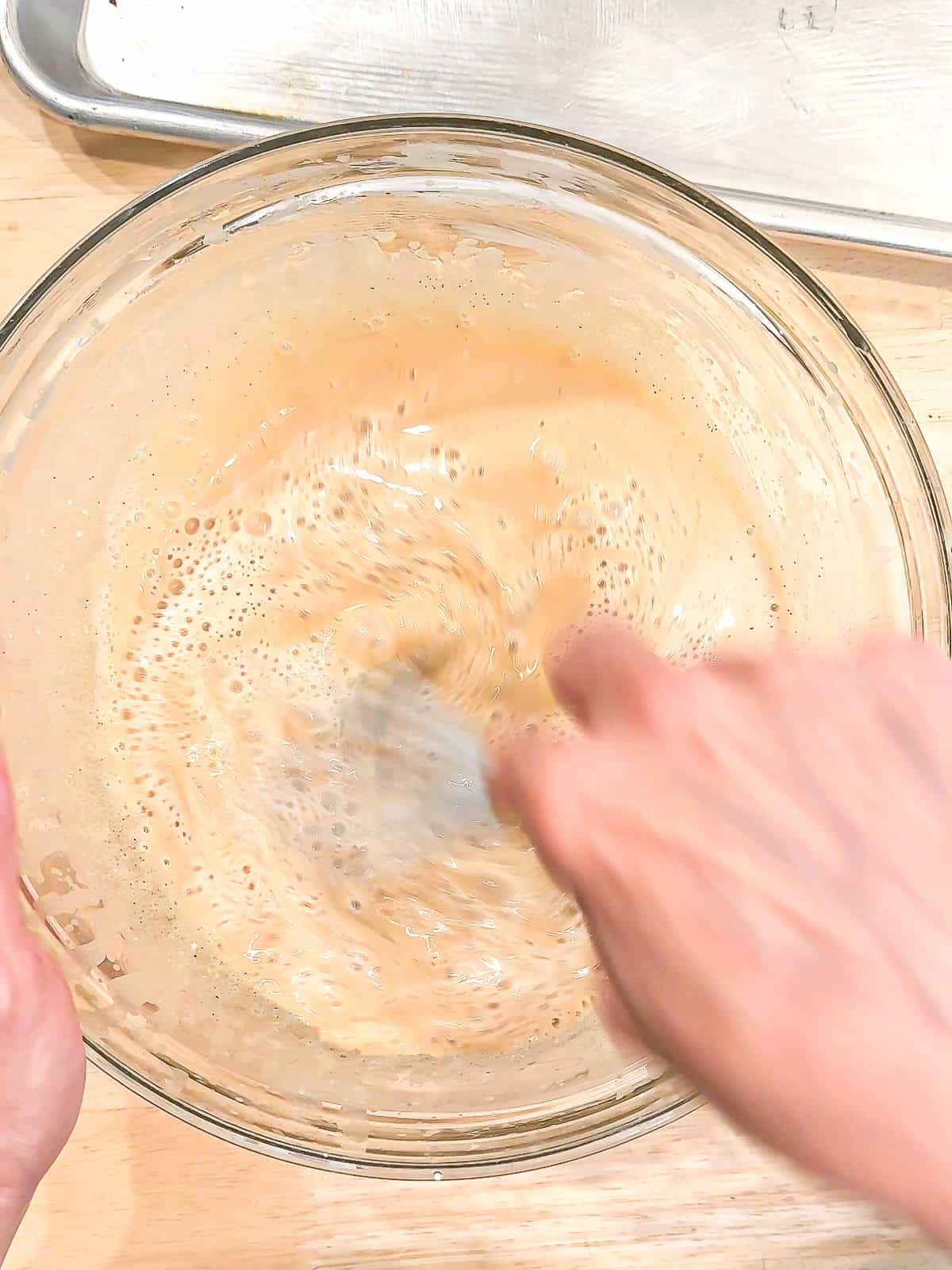 Wet ingredients for chocolate cake whisked together.