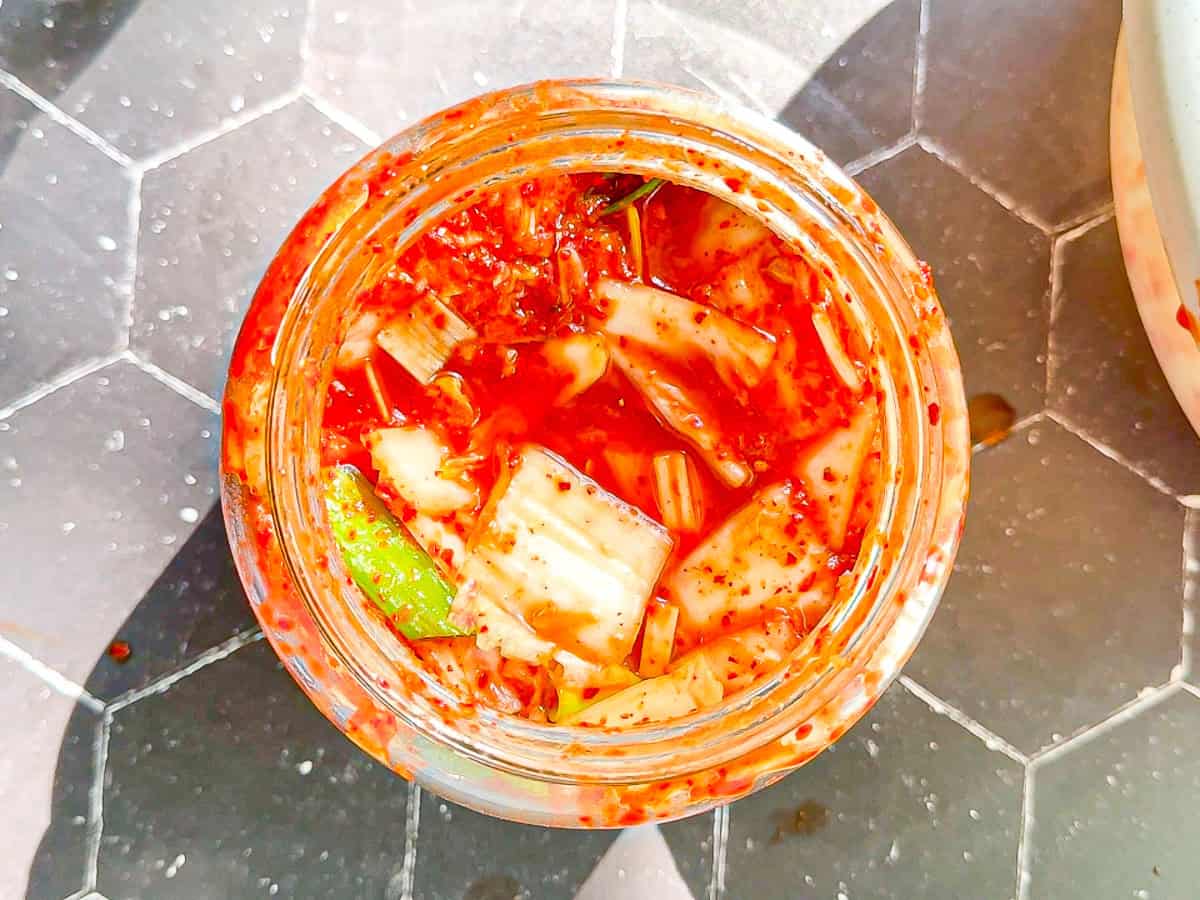 Top view of a jar of kimchi.
