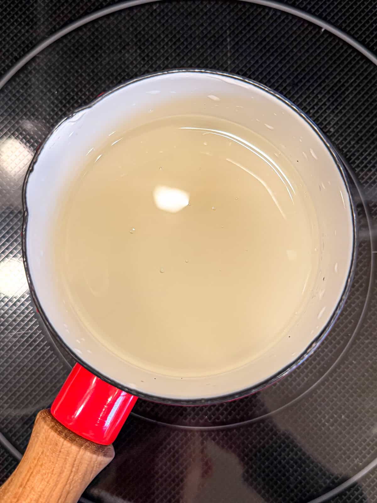 Granulated sugar and water in a small saucepan to make simple syrup.
