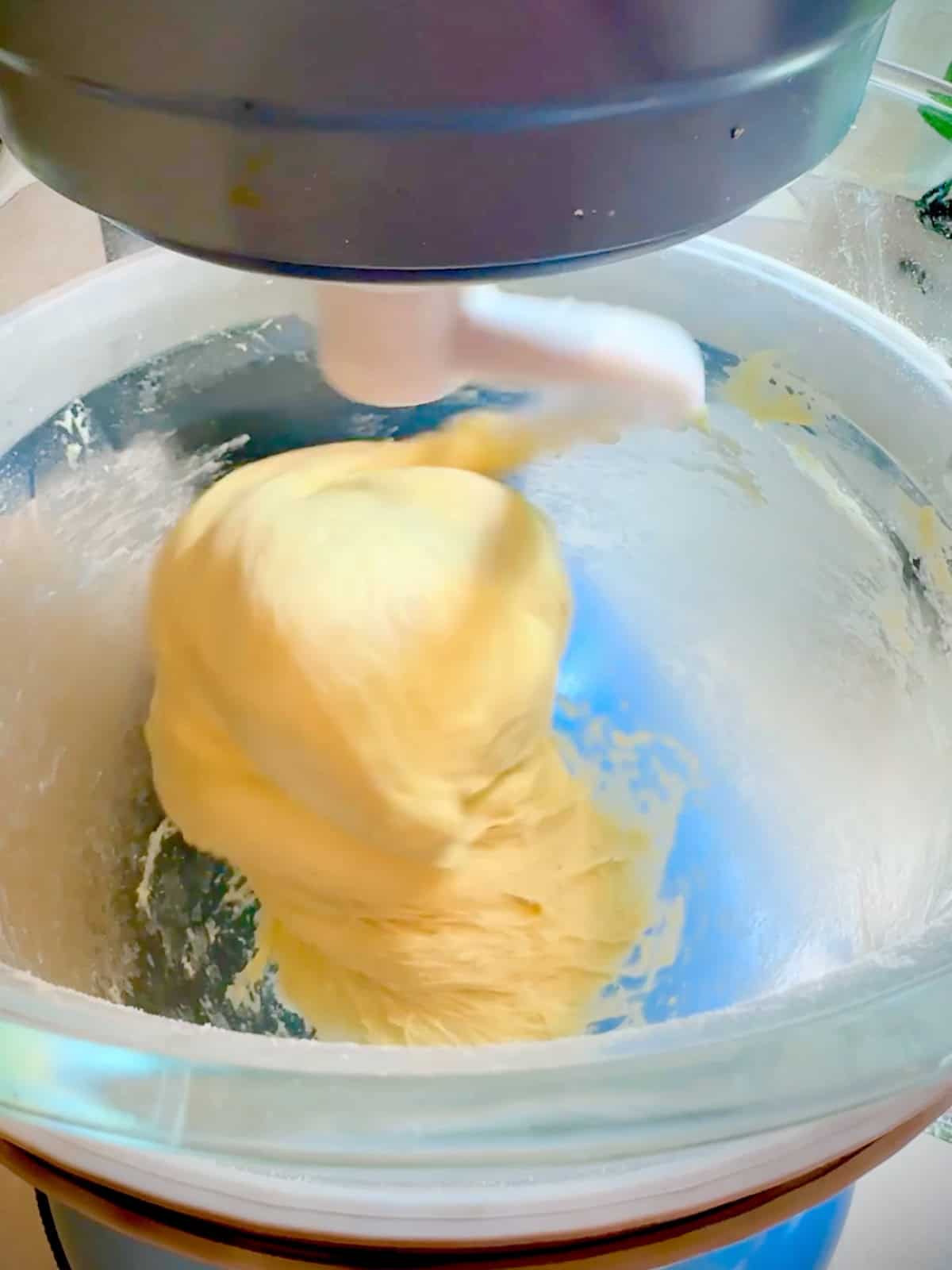 Kneading brioche dough with a stand mixer.
