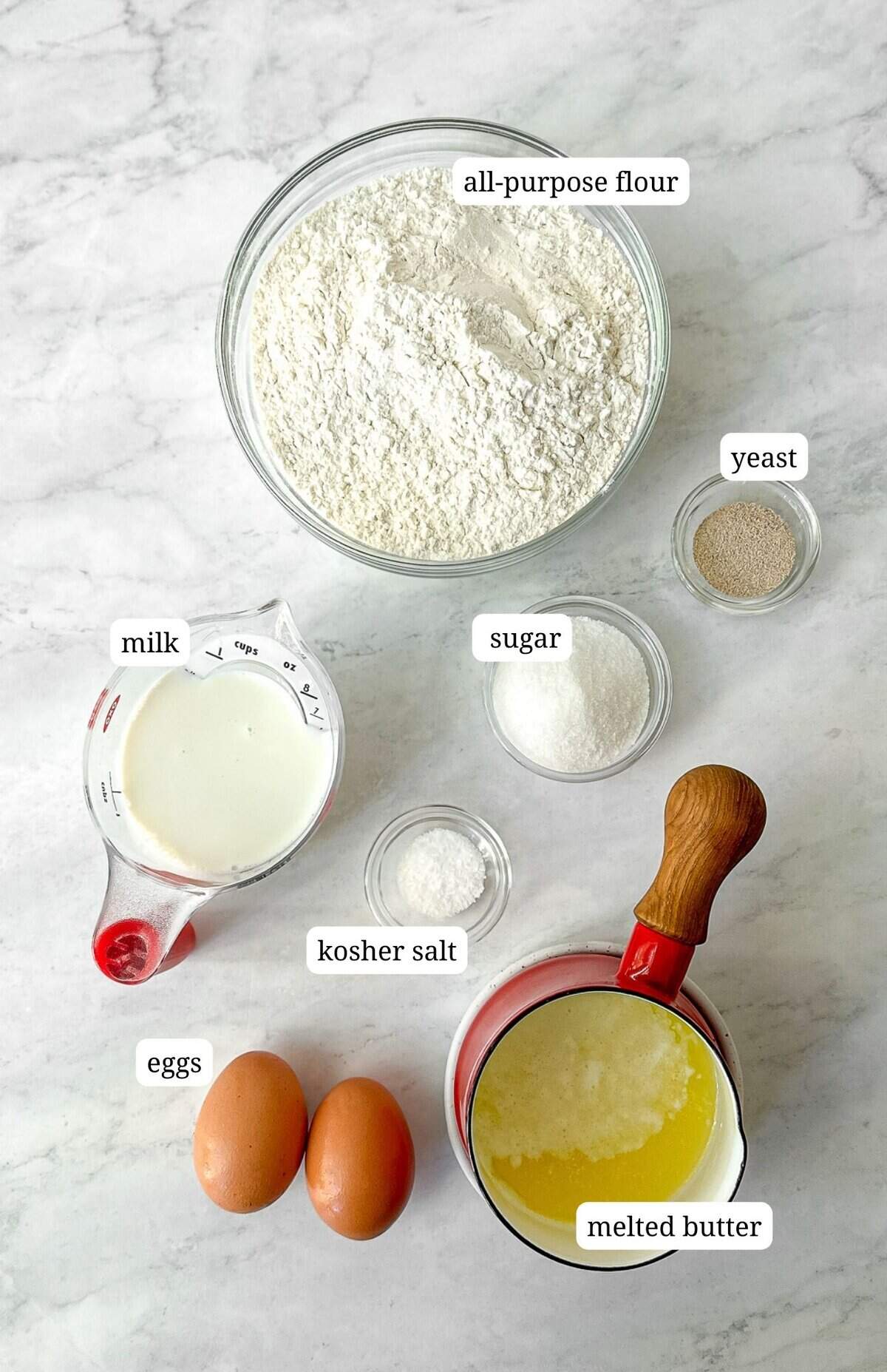 Labeled image of ingredients needed to make brioche buns.