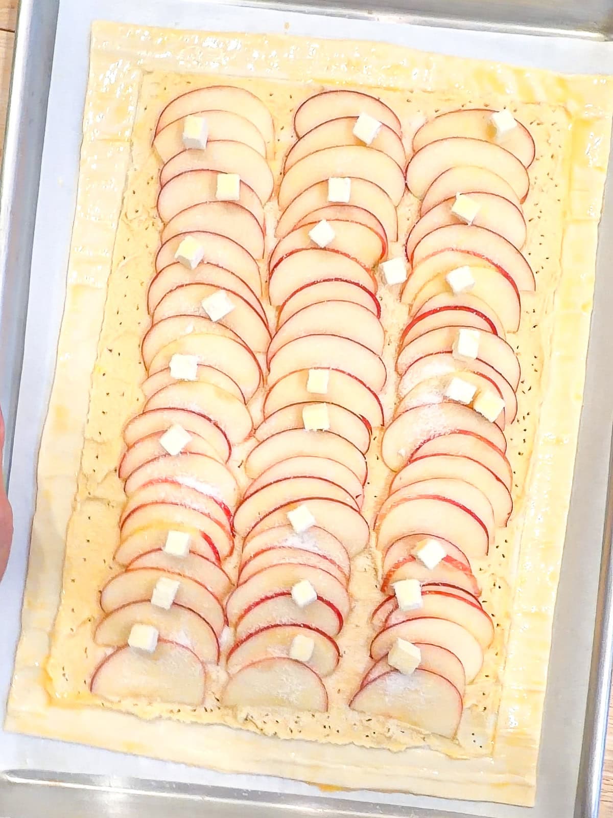 Apple frangipane tart ready to go into the oven.