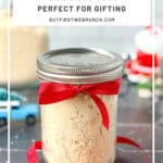 Pinterest image of a jar of biscuit mix with a gift ribbon tied around it.
