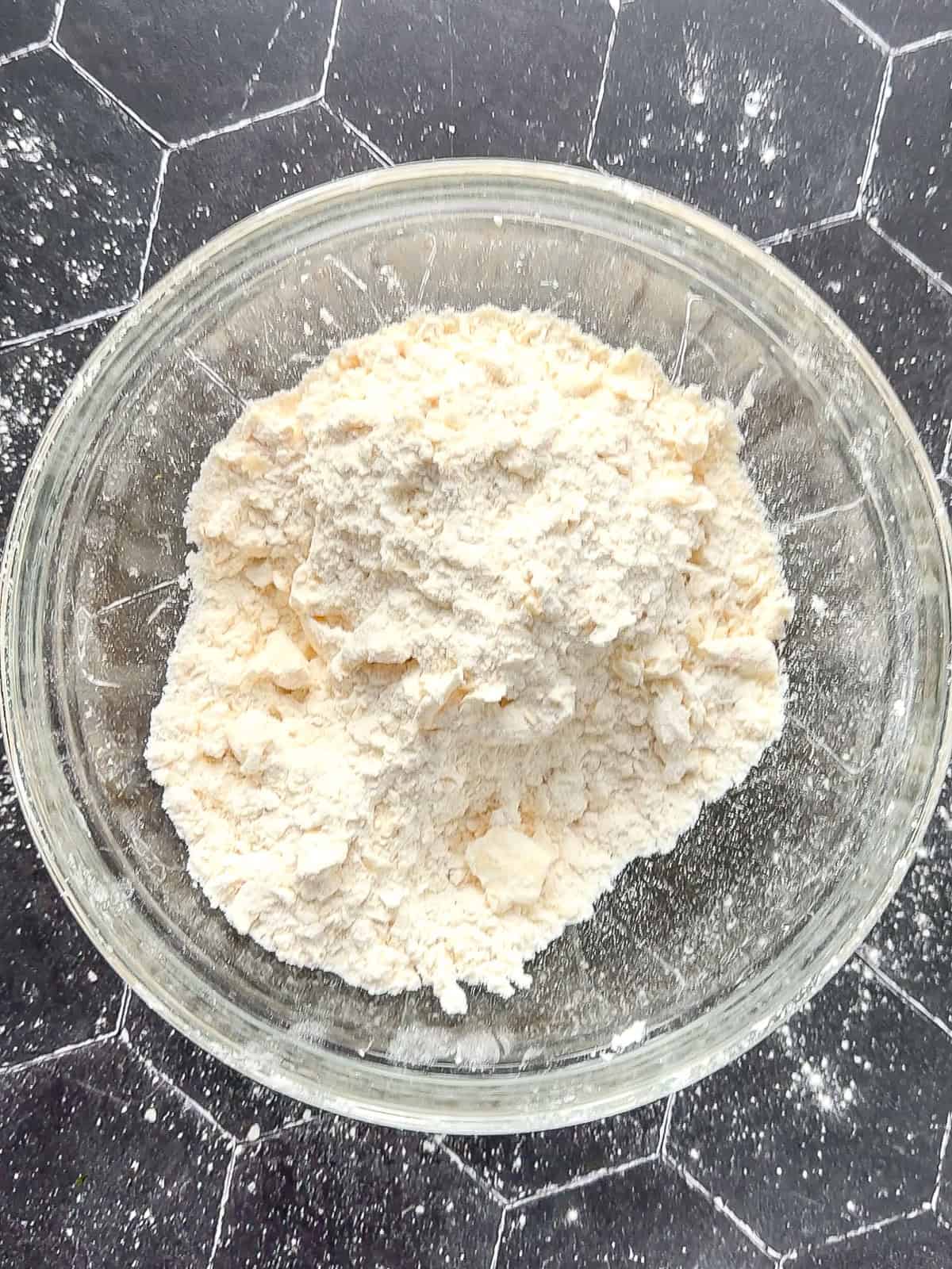 Dry ingredients with butter cut in to make biscuits.