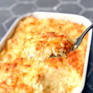 A spoonful of hash brown casserole.
