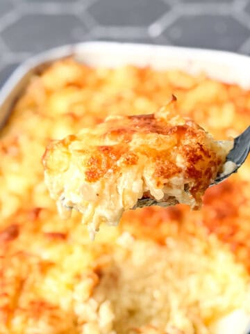 A spoonful of hash brown casserole.