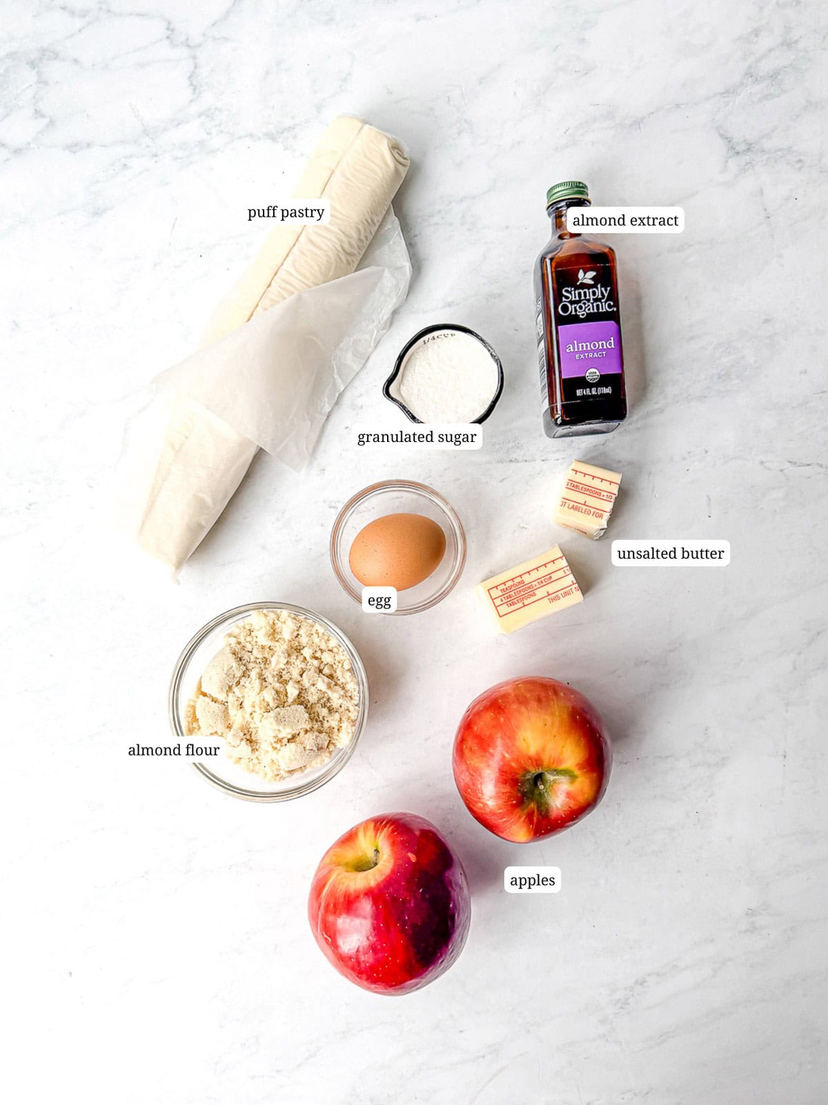 Ingredients needed to make apple frangipane tart.
