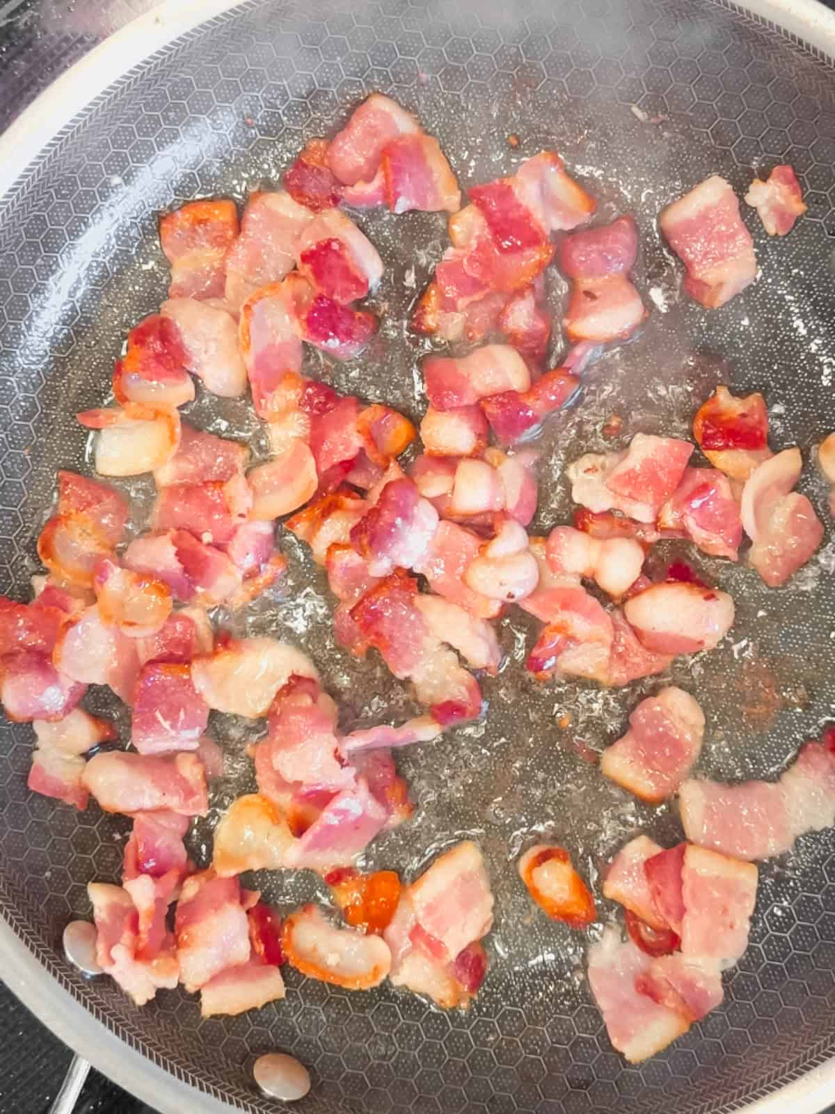 Sautéing bacon.