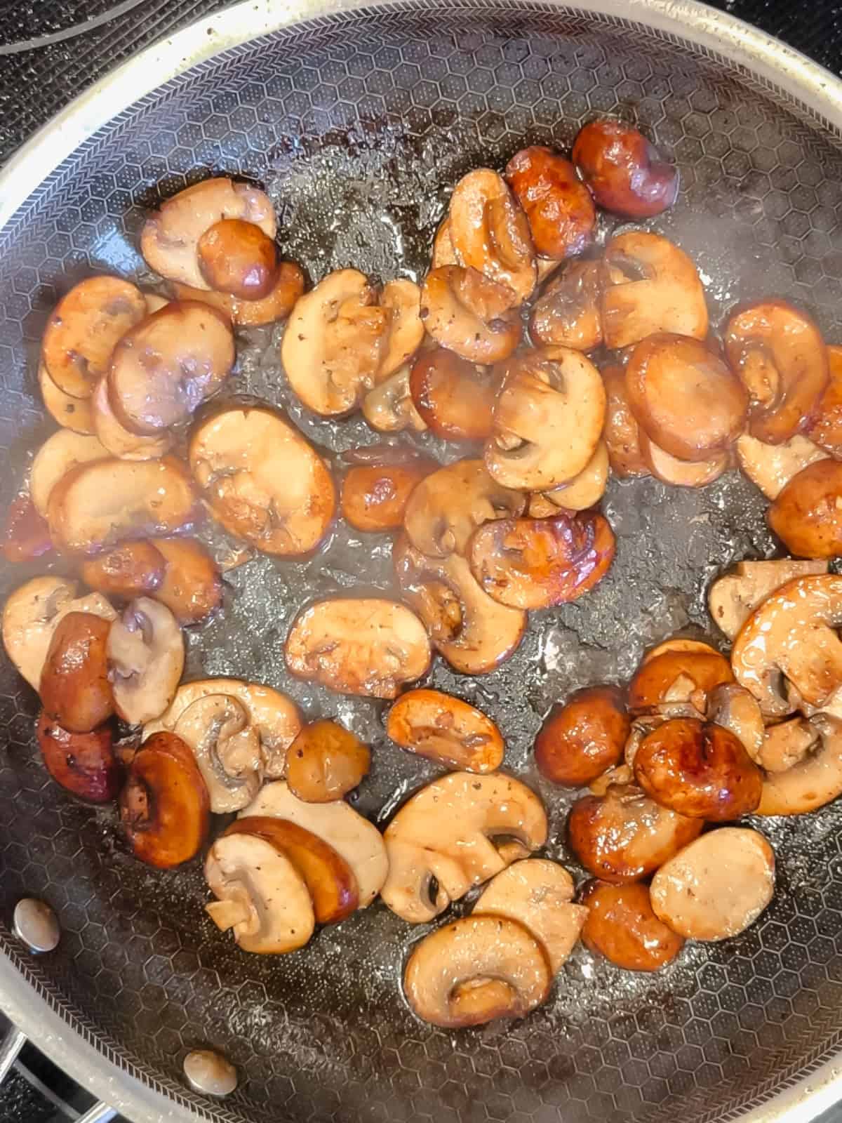 Sauté mushrooms.