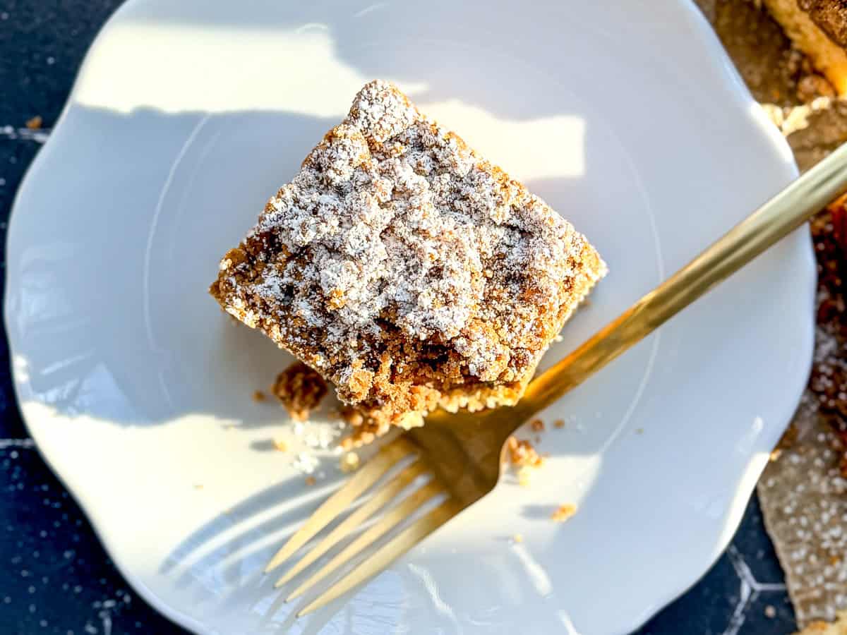 Crumb cake on a white plate.