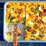Sheet pan frittata in a small sheet pan with a spatula.