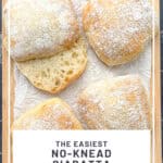 Pinterest image of ciabatta on a wooden cutting board.