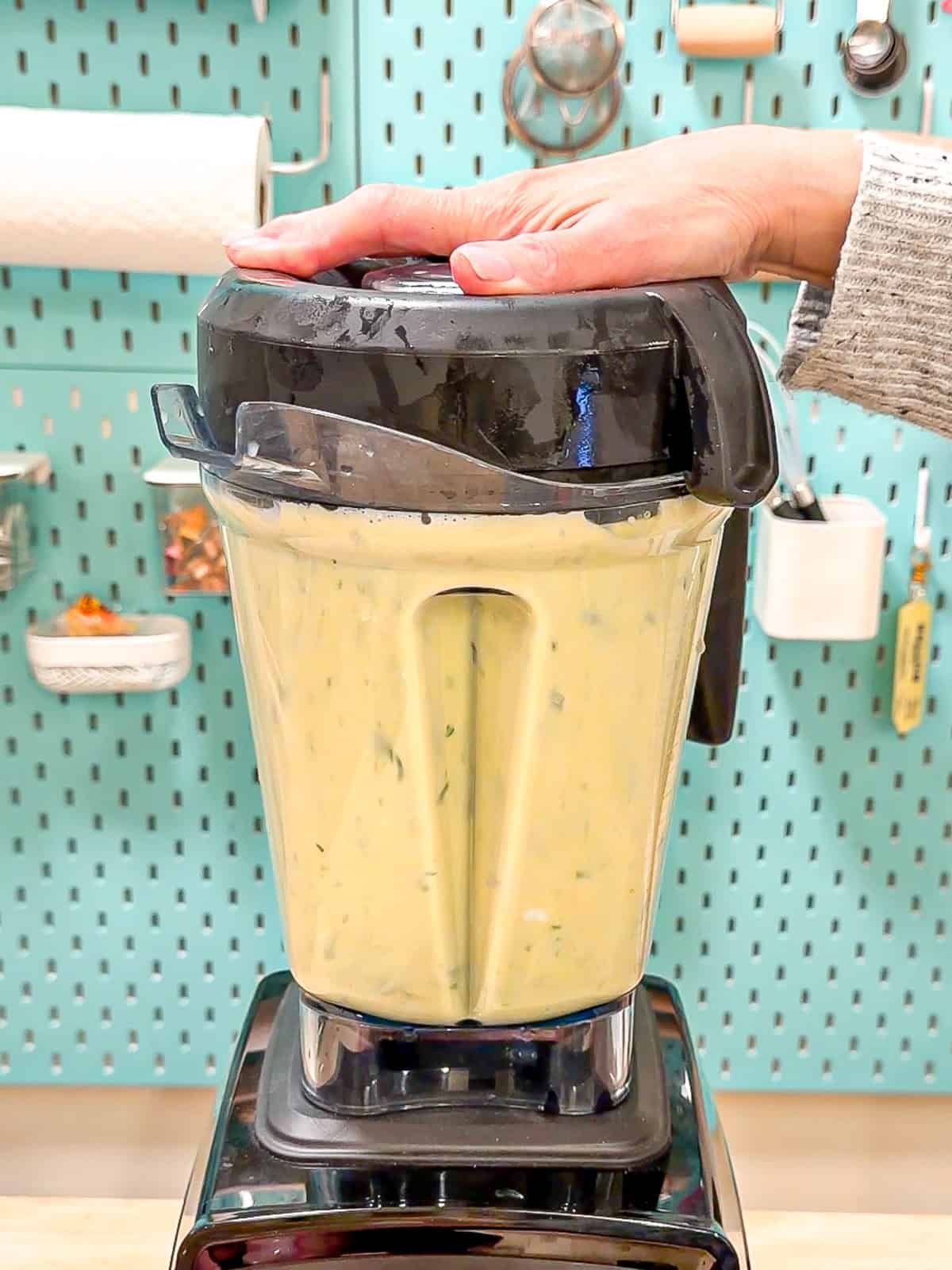 Blending egg mixture in a blender.