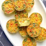 Sous vide egg bites on a white platter.