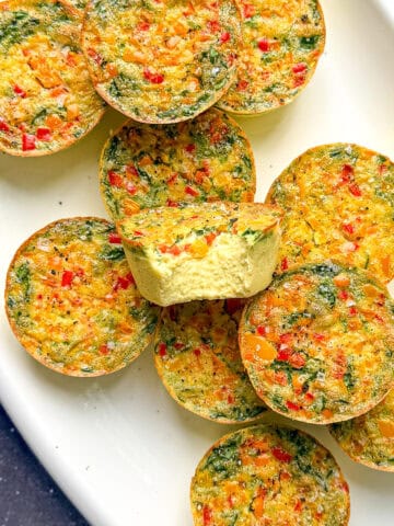 Sous vide egg bites on a white platter.