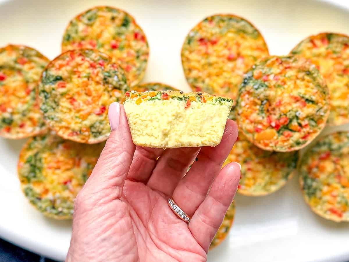 Hand holding a creamy egg bite.