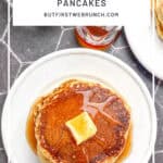 Pinterest image of a stack of pancakes with syrup and butter.