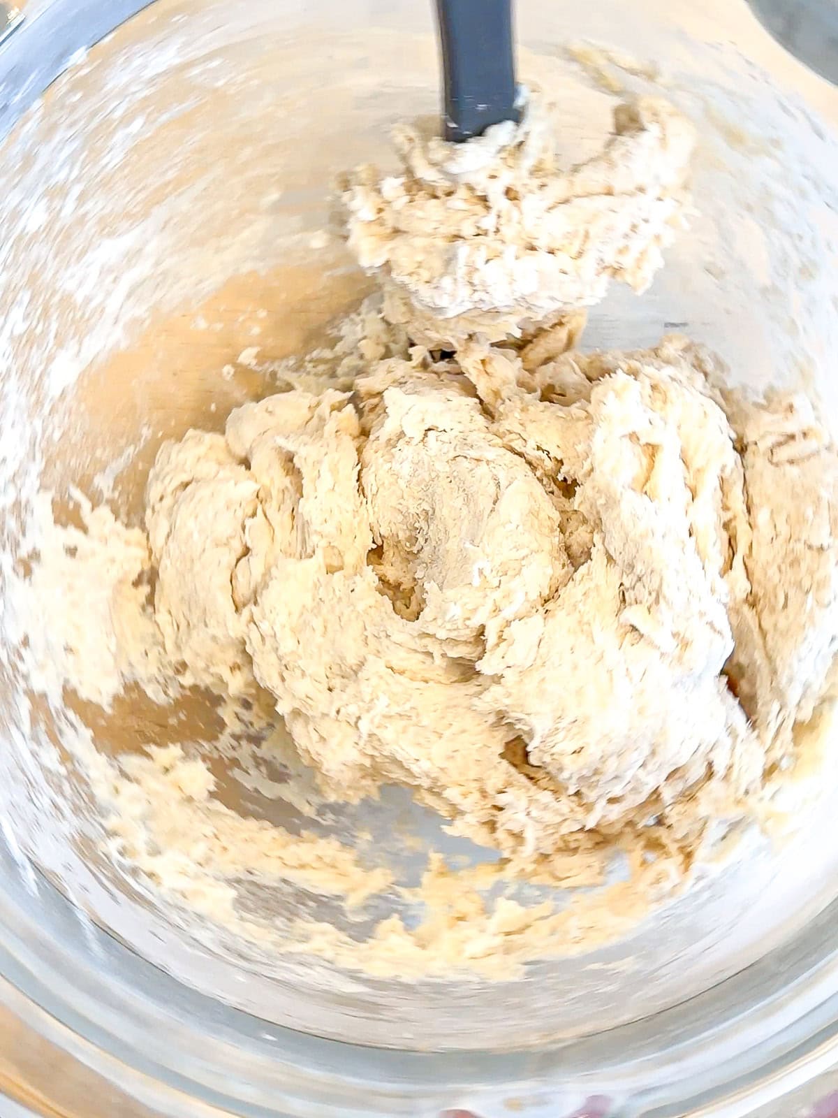 Shaggy dough in a glass bowl.