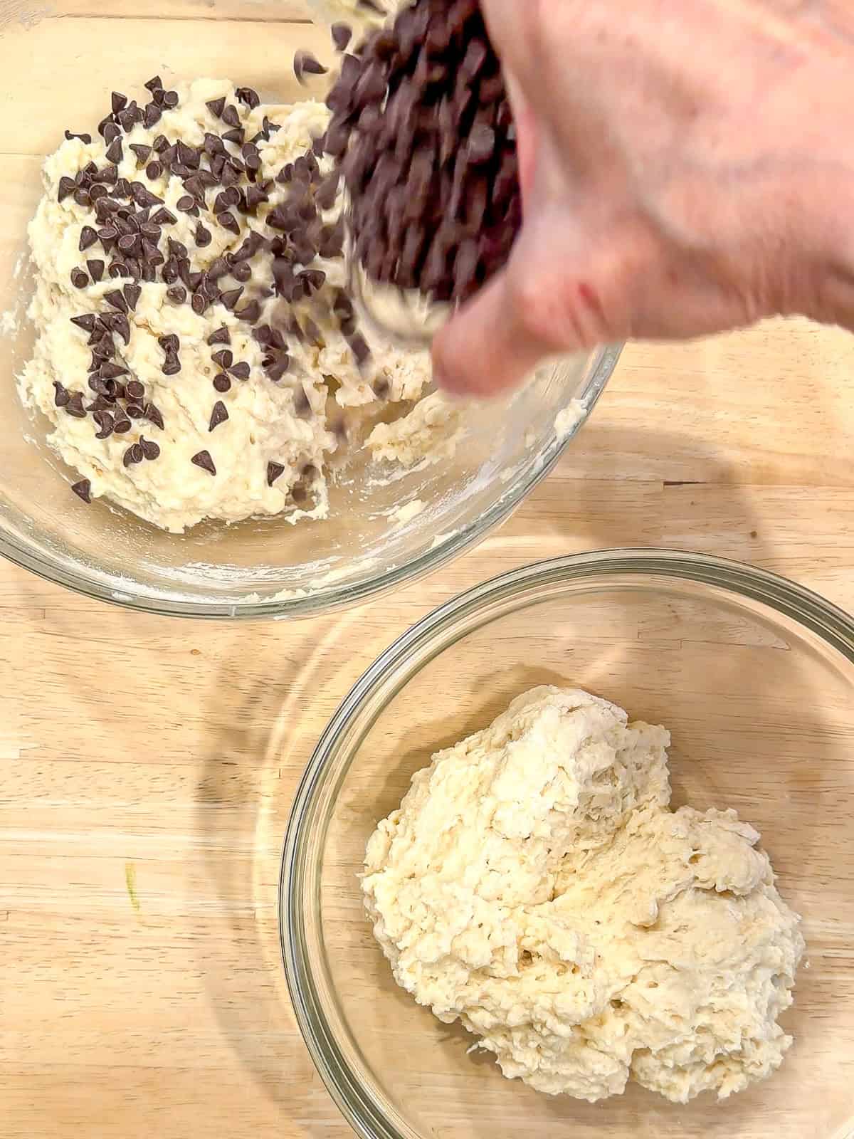 Adding chocolate chips to muffin batter.