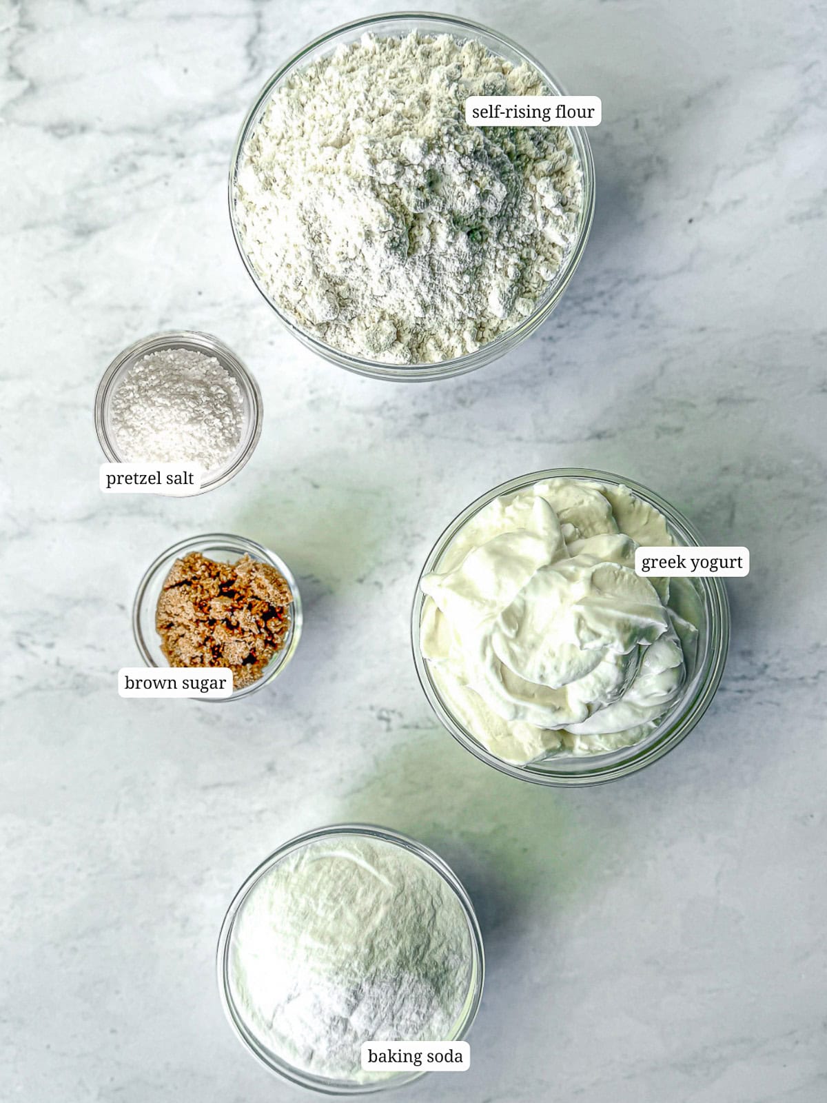 Labeled image of ingredients needed to make soft yogurt pretzels.