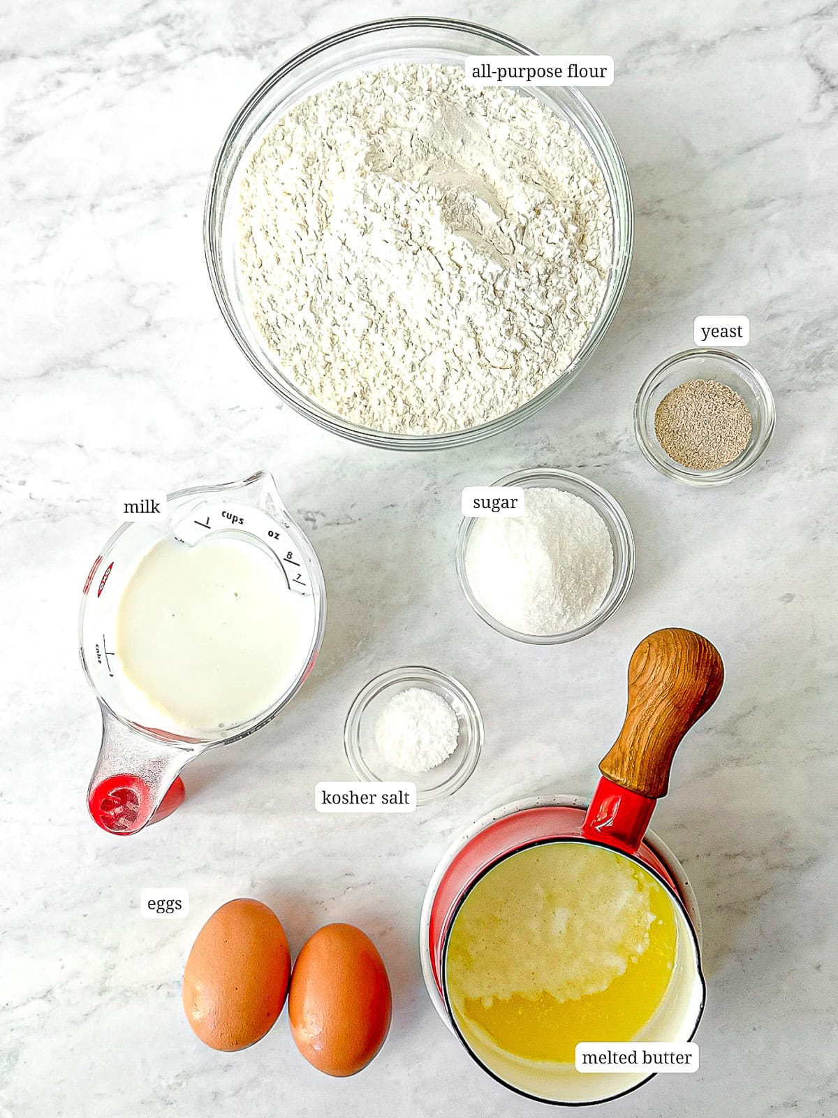Ingredients needed to make brioche dough.