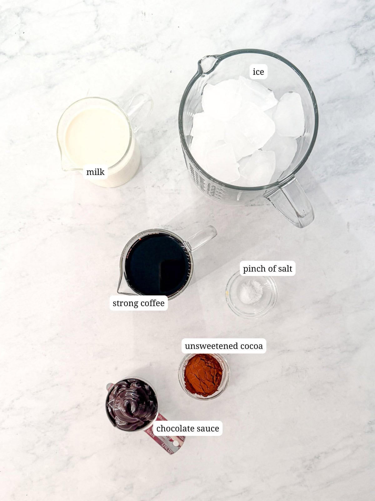 Ingredients needed to make mocha Frappuccino.
