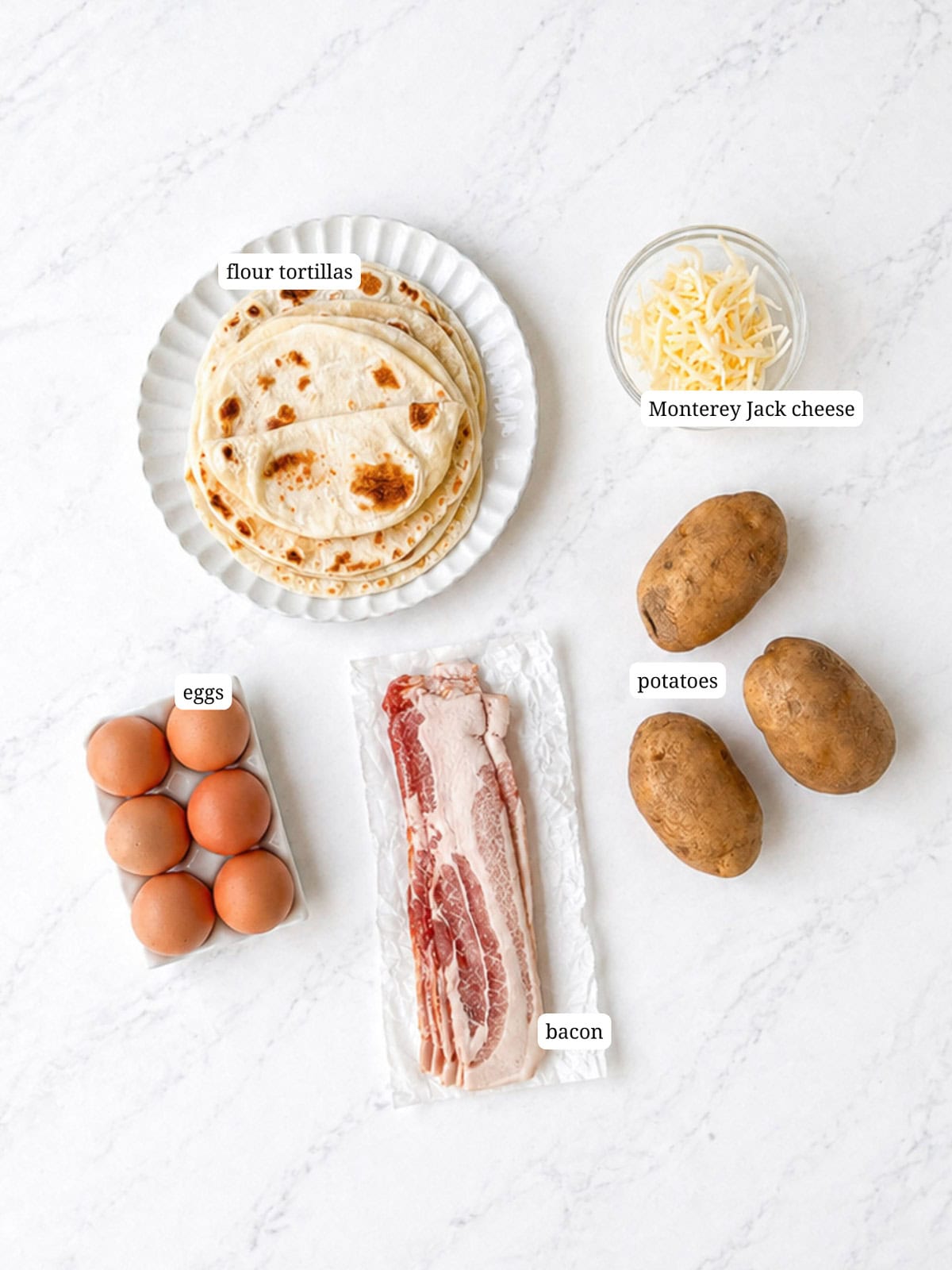 Labeled image of ingredients needed to make bacon and egg breakfast tacos.