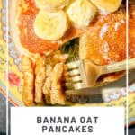 Pinterest image of a stack of banana oatmeal pancake pancakes on a yellow floral plate.