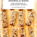 Pinterest image of granola bars on a wooden cutting board.