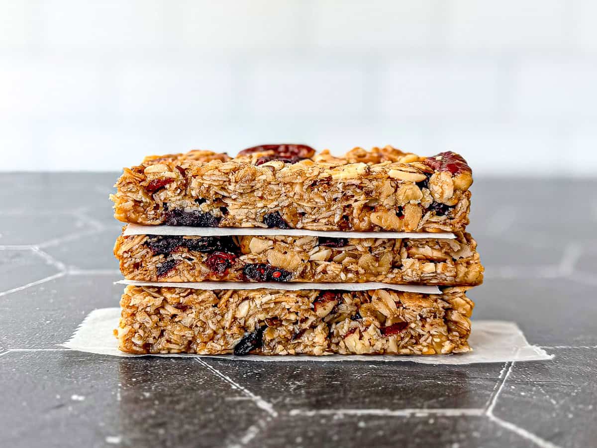Stack of granola bars on a Black counter.