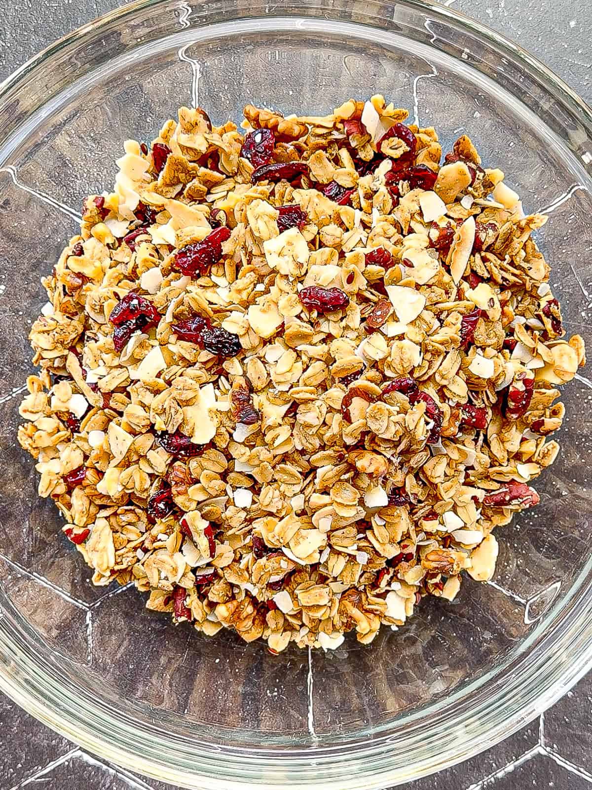 Granola and a glass bowl.