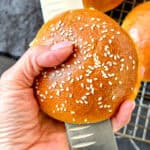 Sliding open a hamburger bun.