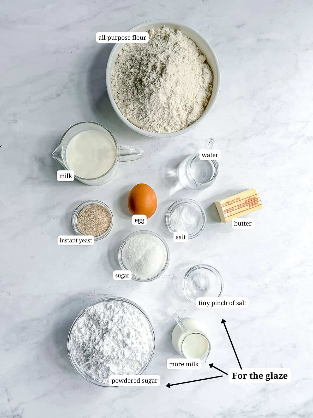 Ingredients needed to make classic glazed donuts.